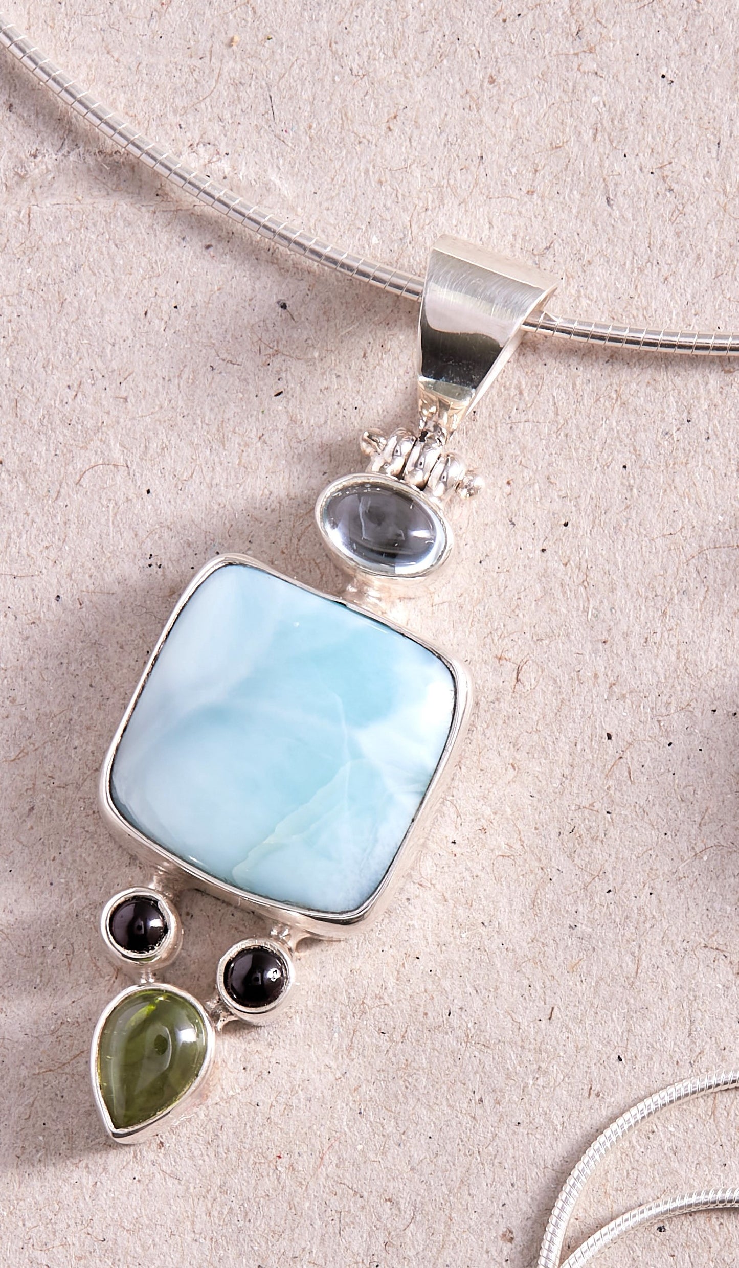 Larimar Blue Topaz Peridot and Garnet Pendant